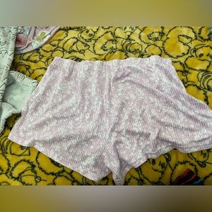 Little pink shorts with pretty white floral designs